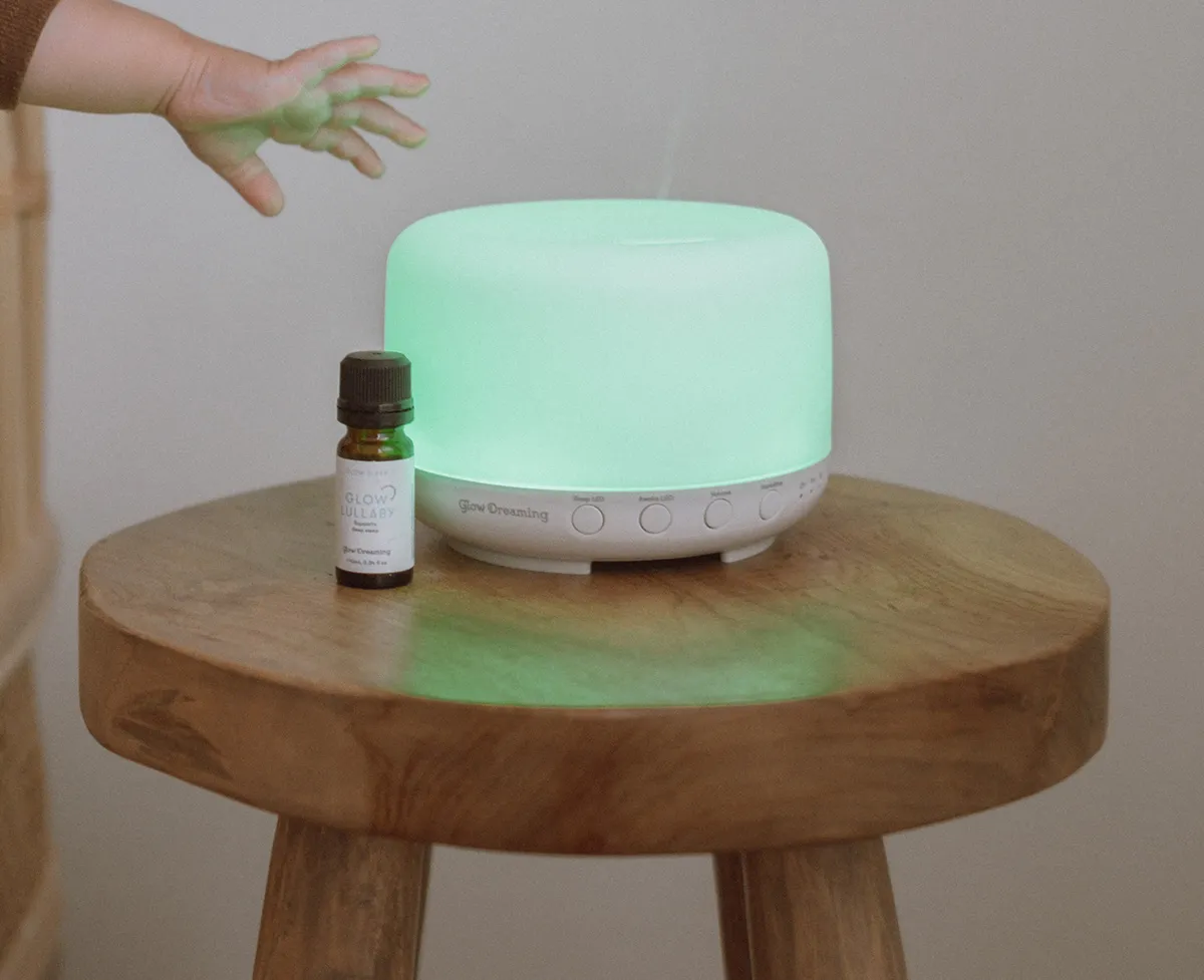 Glow Dreaming diffuser on a wooden table